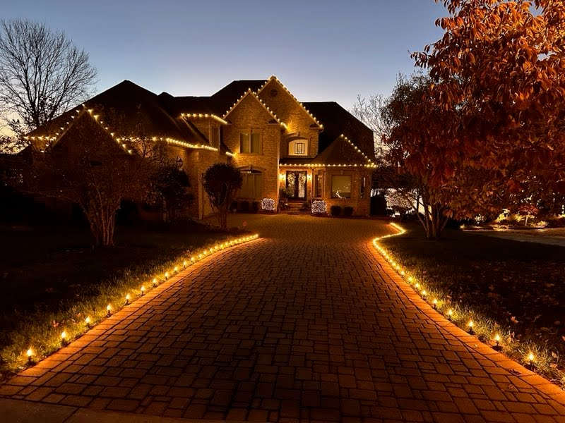 Classic Brick Home with Christmas Lighting by Charlotte's Best Christmas Lights in Charlotte, NC